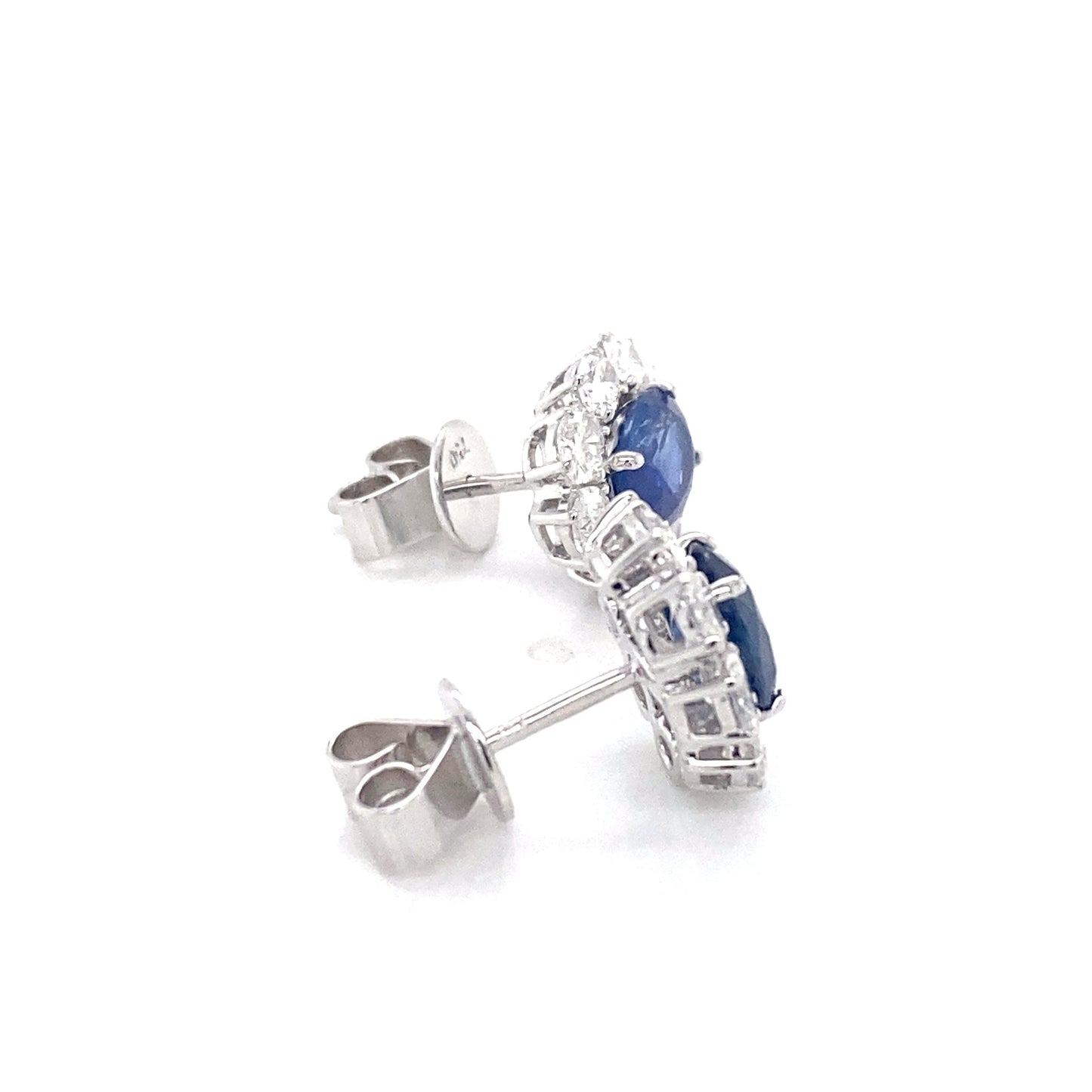 Oval Shaped Sapphire and oval shaped diamond cluster style earrings Gardiner Brothers