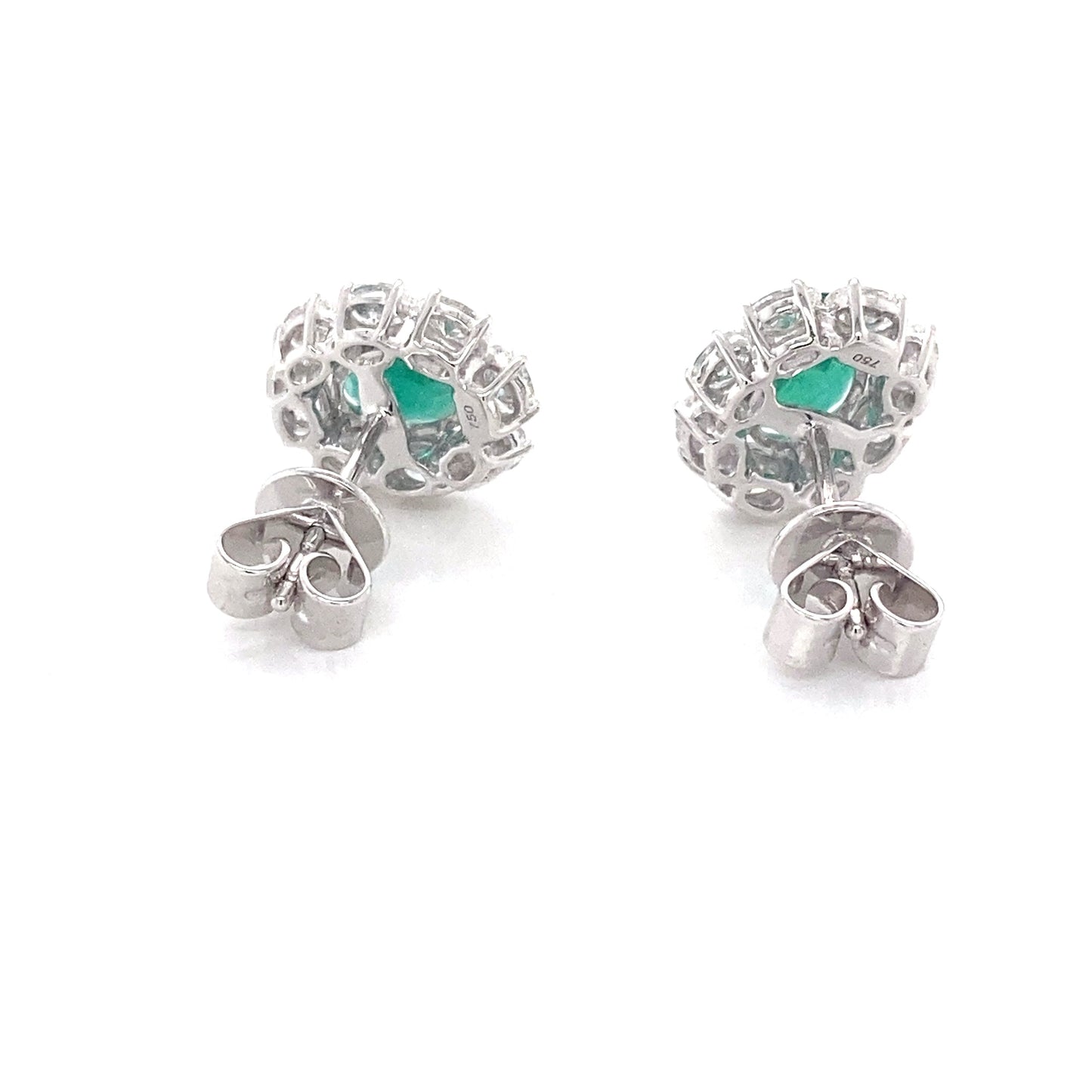 Oval shaped emerald and oval diamonds cluster style earrings Gardiner Brothers