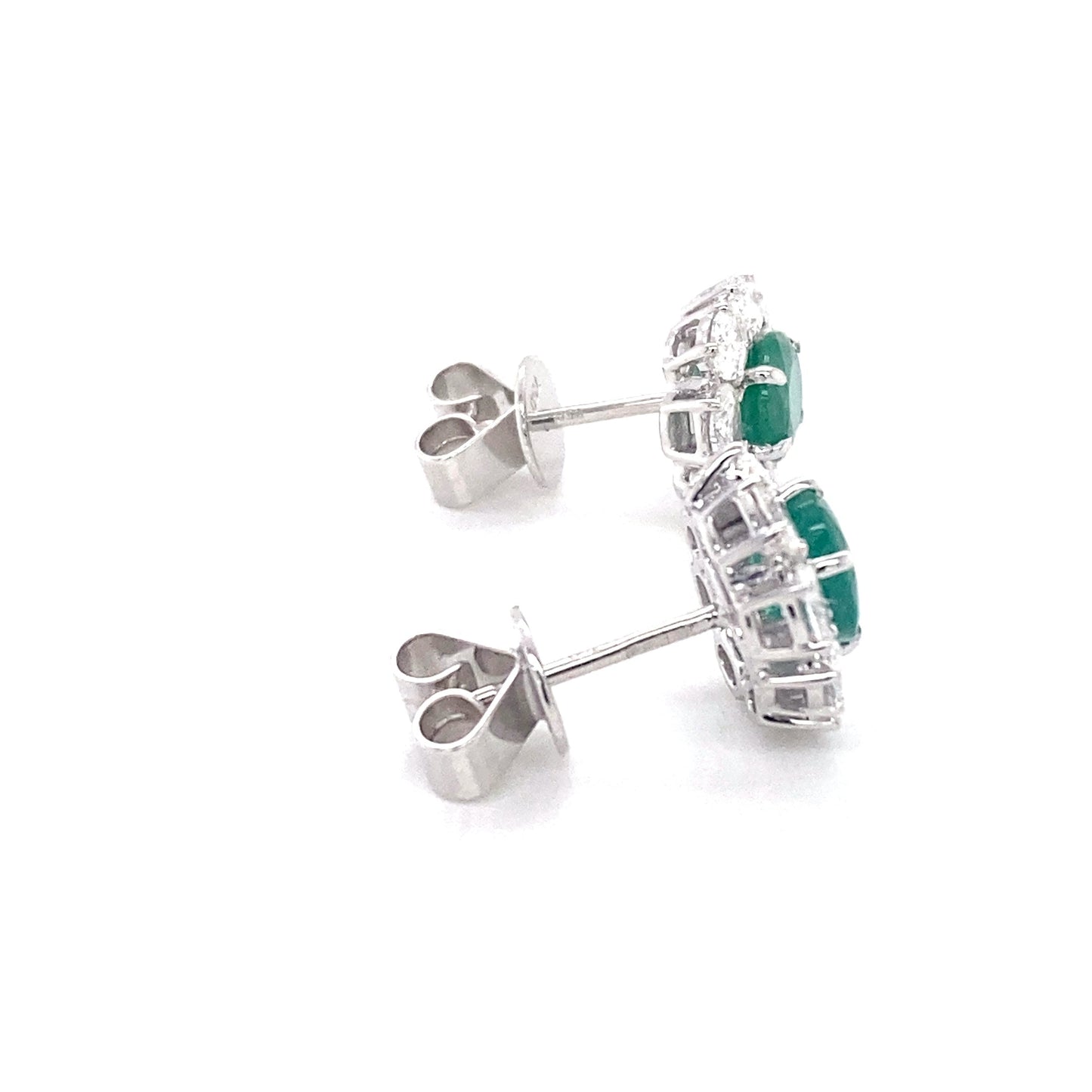 Oval shaped emerald and oval diamonds cluster style earrings Gardiner Brothers