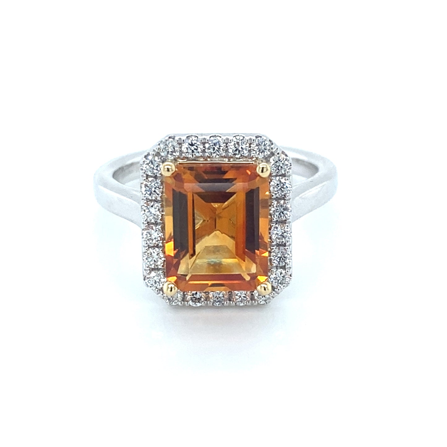 Octagonal Citrine and round brilliant cut diamond halo style ring Gardiner Brothers