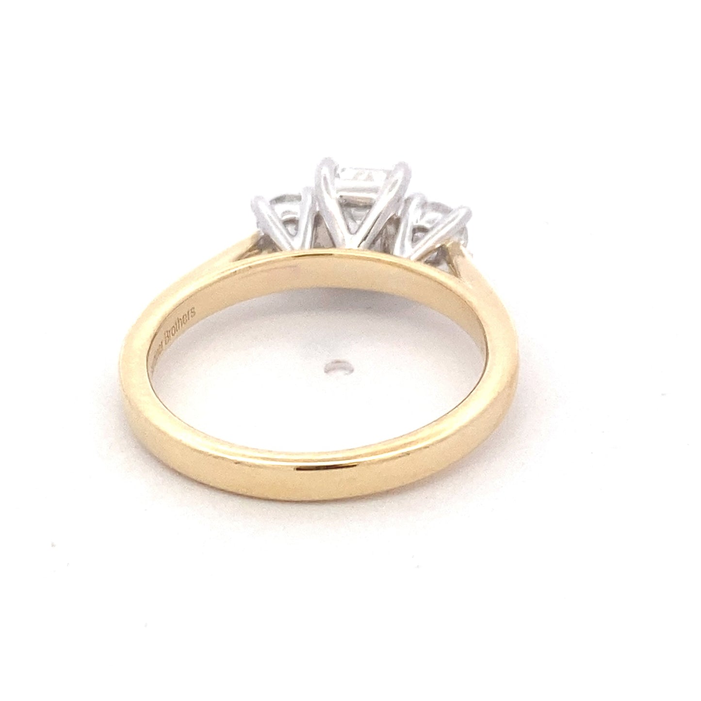 Yellow Gold Emerald and round brilliant cut diamond 3 stone ring - 1.03cts Gardiner Brothers