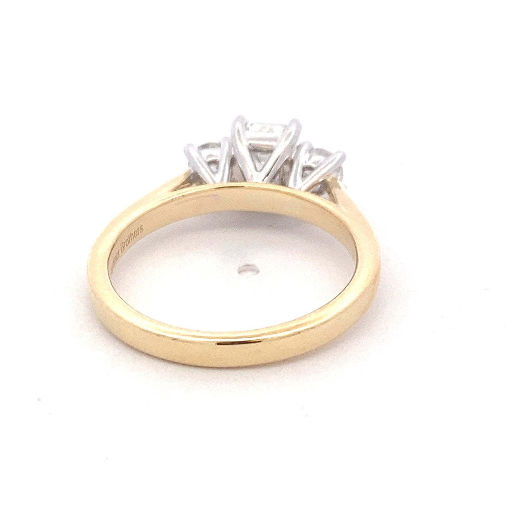 Yellow Gold Emerald and round brilliant cut diamond 3 stone ring - 1.03cts Gardiner Brothers