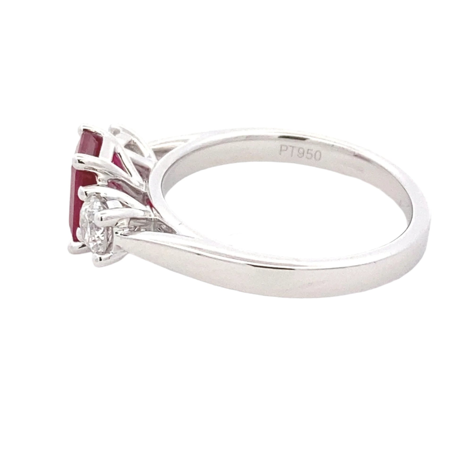 Octagonal Ruby and round brilliant cut diamond 3 stone ring Gardiner Brothers