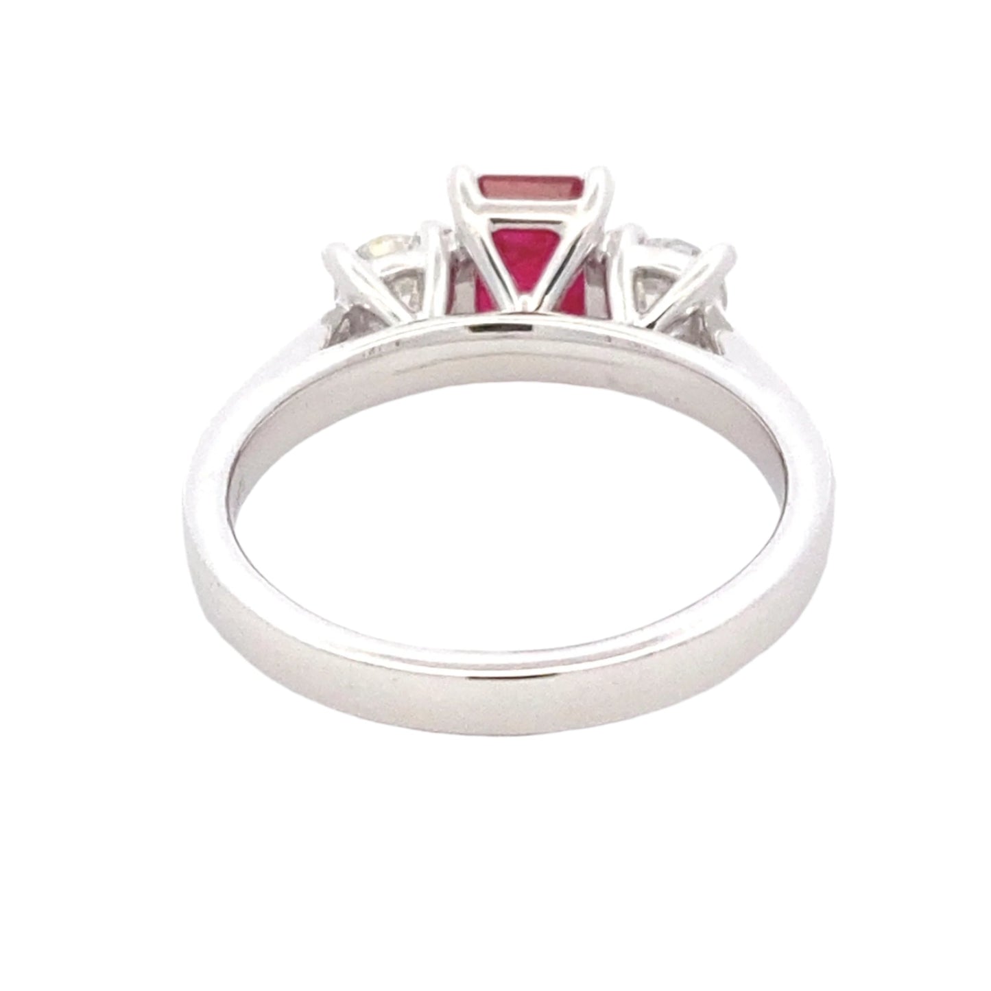 Octagonal Ruby and round brilliant cut diamond 3 stone ring Gardiner Brothers