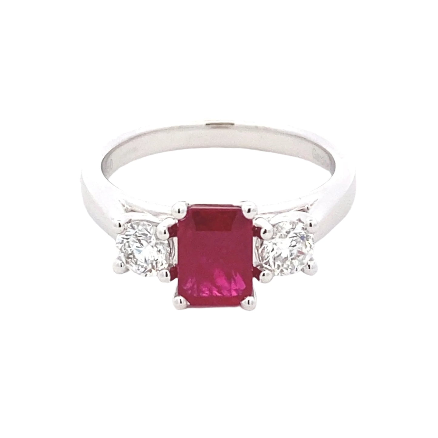 Octagonal Ruby and round brilliant cut diamond 3 stone ring Gardiner Brothers