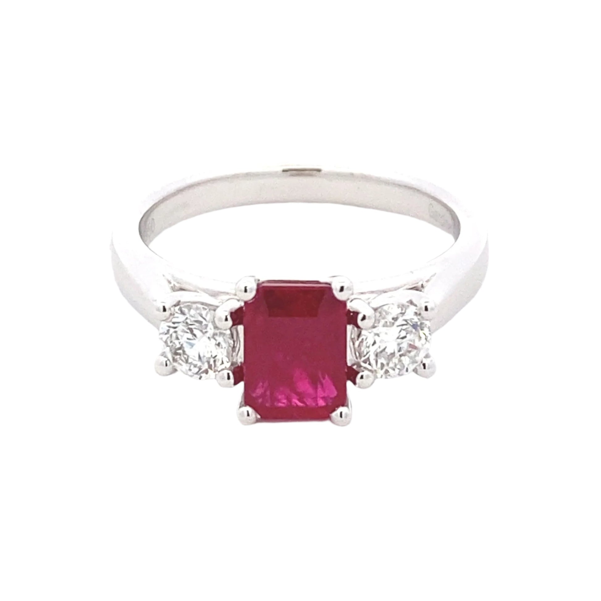 Octagonal Ruby and round brilliant cut diamond 3 stone ring Gardiner Brothers