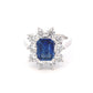 Octagonal shaped sapphire and round brilliant cut diamond cluster style ring Gardiner Brothers