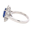 Octagonal shaped sapphire and round brilliant cut diamond cluster style ring Gardiner Brothers