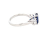 Octagonal Shaped Sapphire and round brilliant cut diamond 3 stone ring Gardiner Brothers