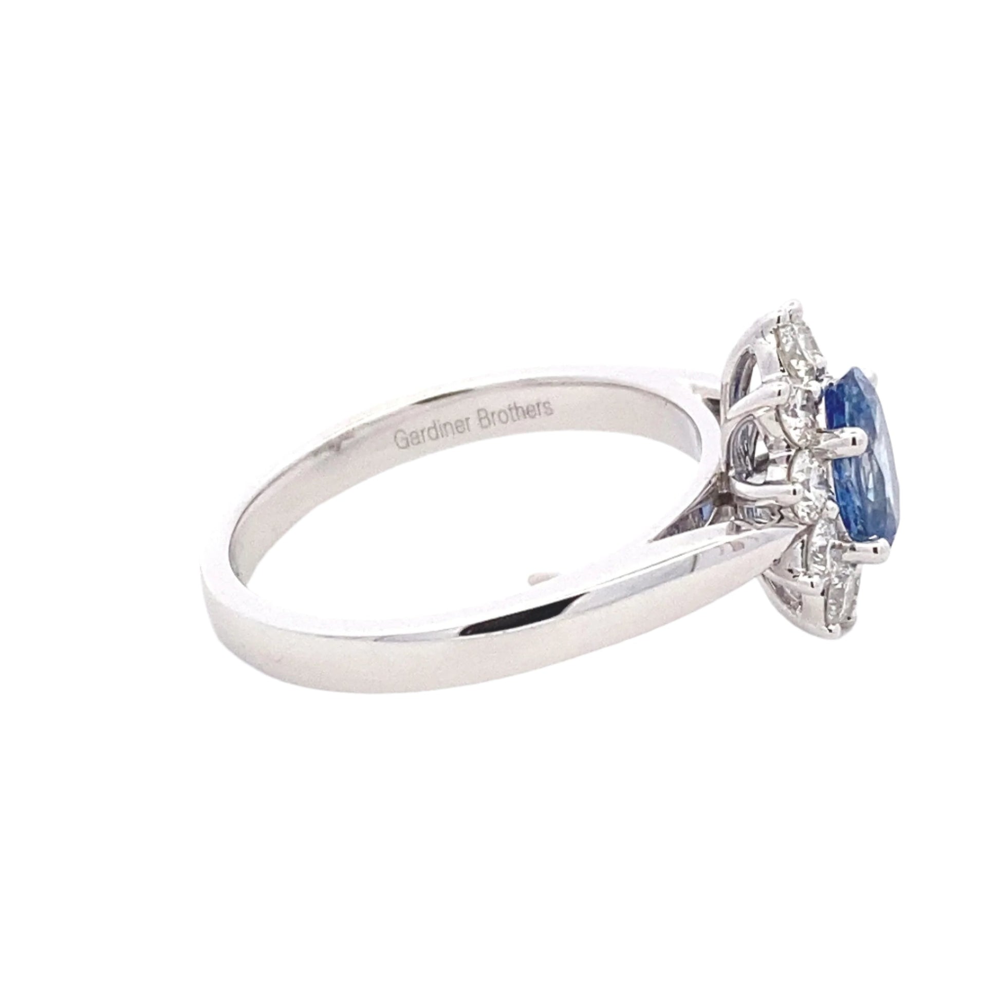 Ceylon sapphire and round brilliant cut diamond cluster ring Gardiner Brothers