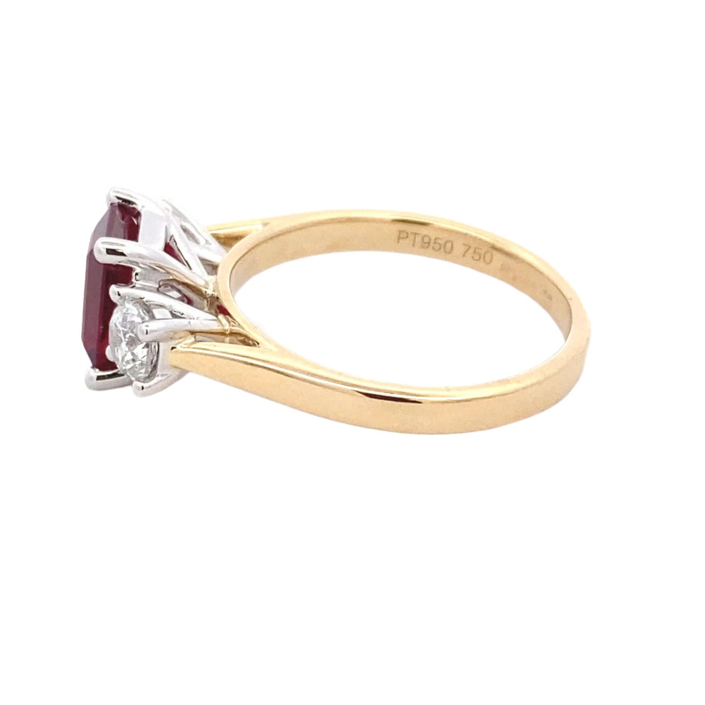 Octagonal Ruby and round brilliant cut diamond 3 stone ring Gardiner Brothers