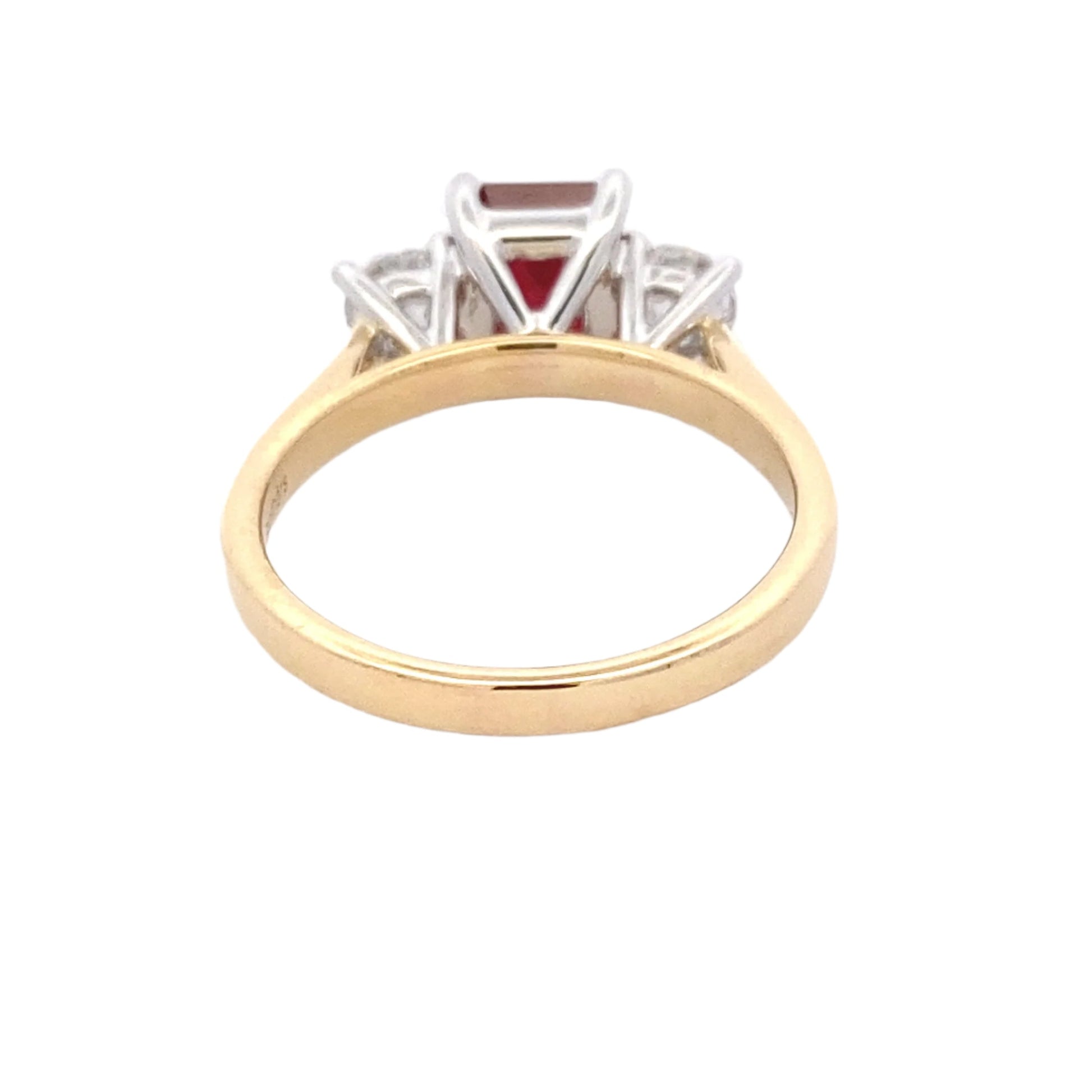 Octagonal Ruby and round brilliant cut diamond 3 stone ring Gardiner Brothers