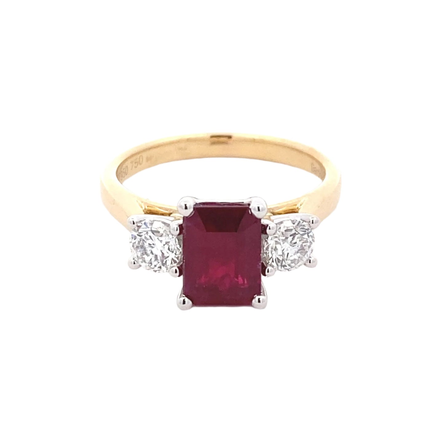 Octagonal Ruby and round brilliant cut diamond 3 stone ring Gardiner Brothers