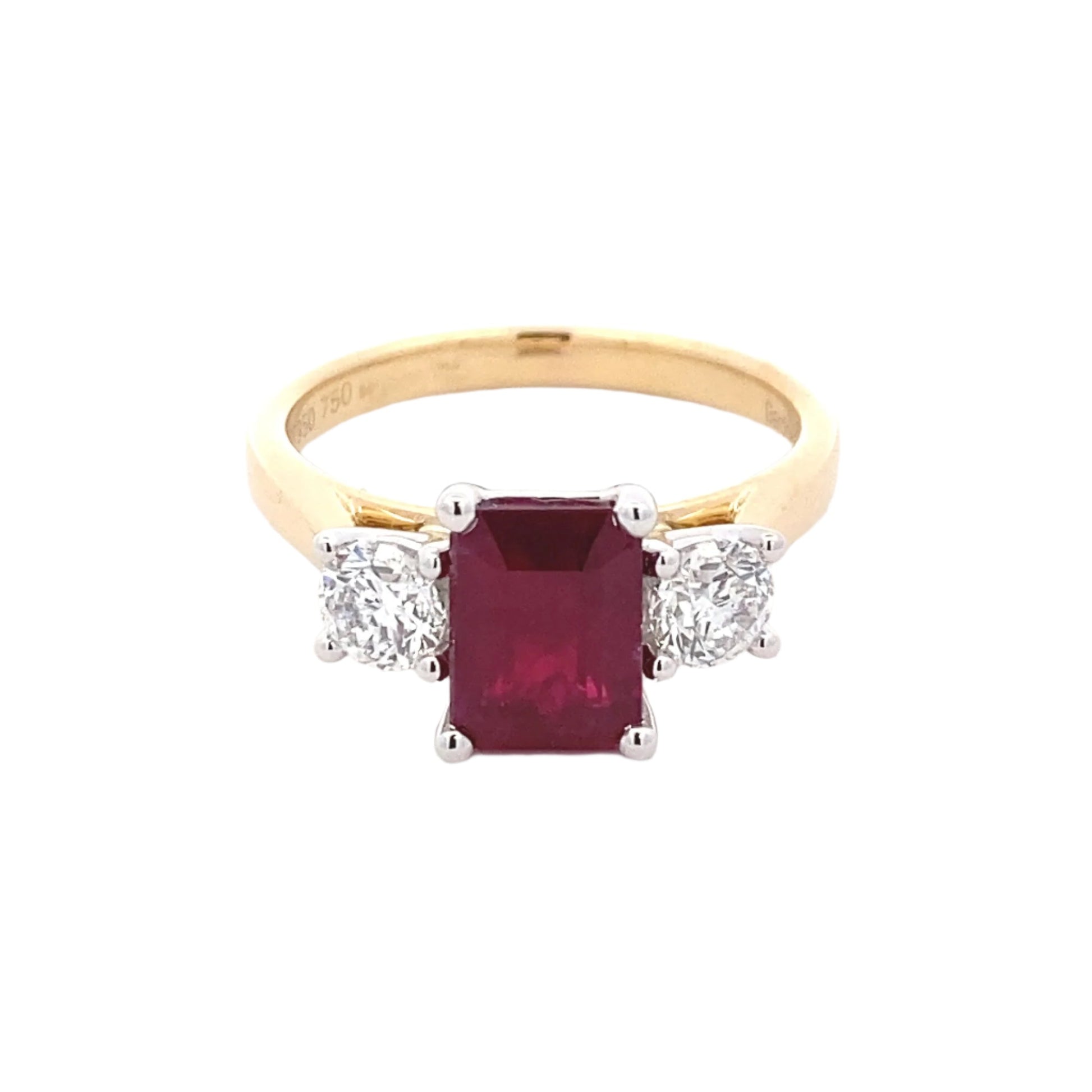Octagonal Ruby and round brilliant cut diamond 3 stone ring Gardiner Brothers