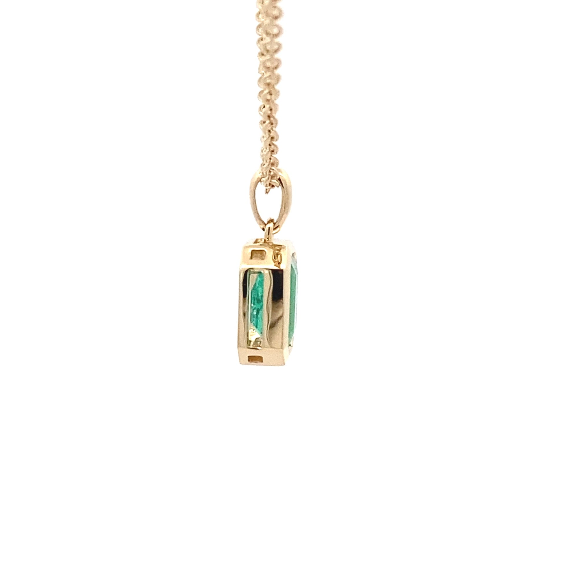Octagonal Shaped emerald set in a yellow gold pendant Gardiner Brothers