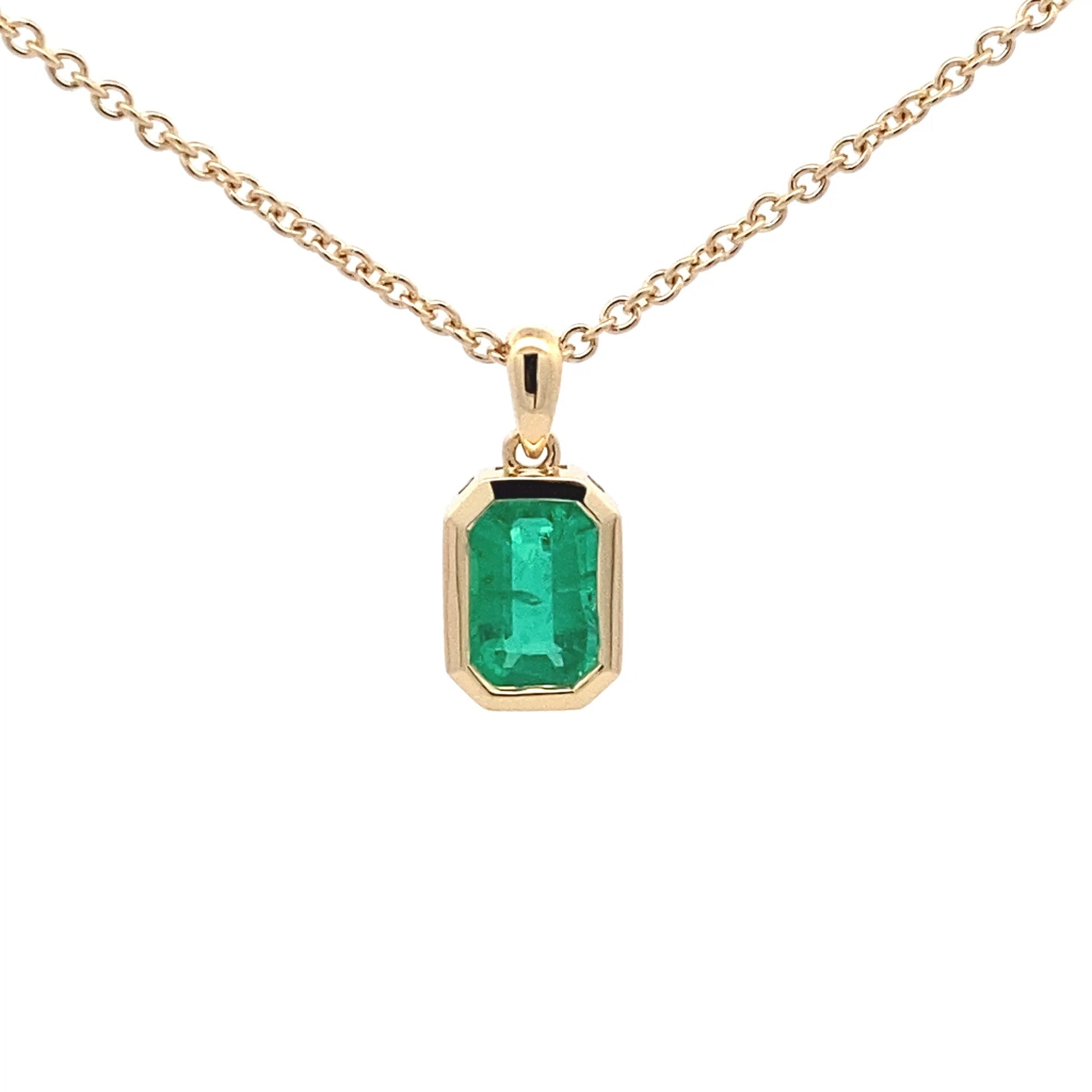 Octagonal Shaped emerald set in a yellow gold pendant Gardiner Brothers