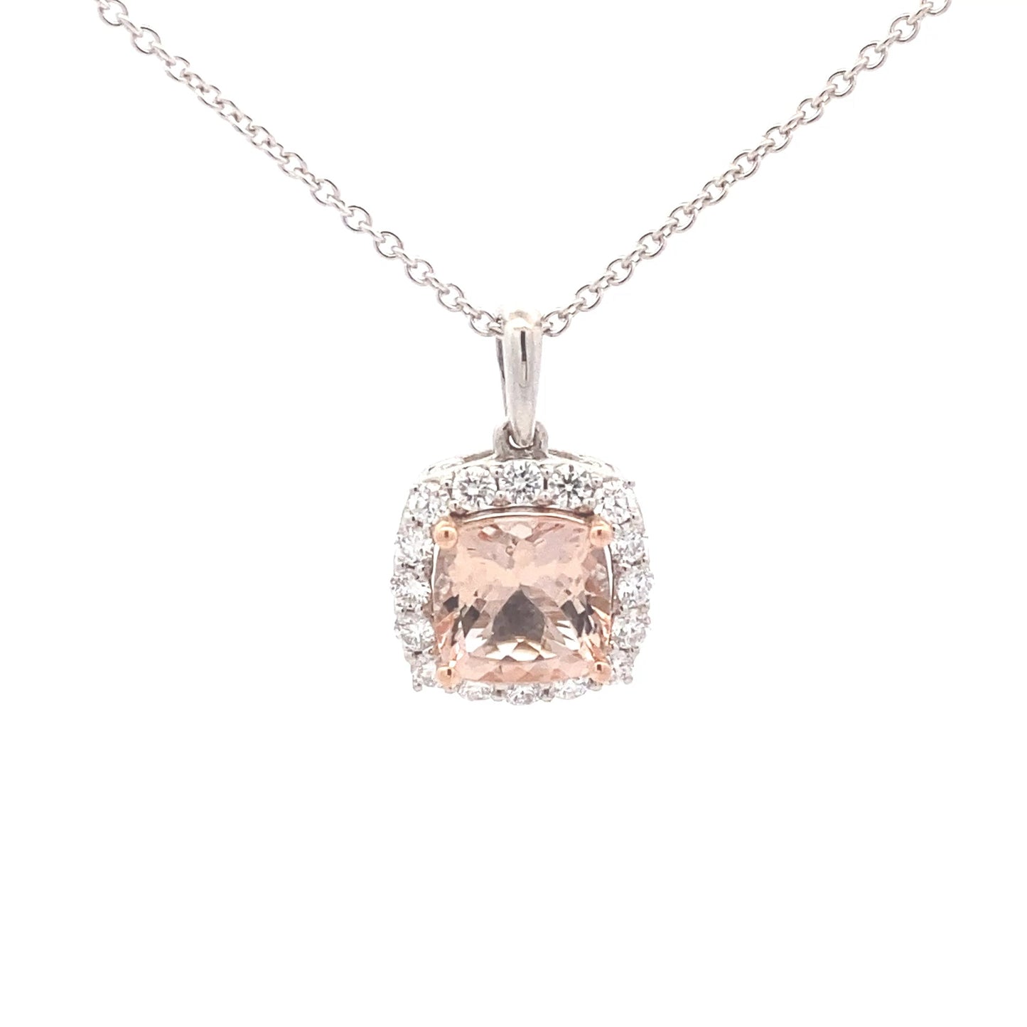 Cushion Shaped Morganite and round brilliant cut diamond halo pendant Gardiner Brothers