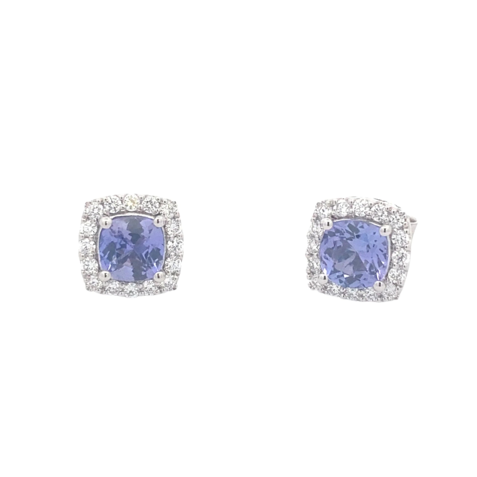 Cushion Shaped Tanzanite and round brilliant cut diamond halo earrings Gardiner Brothers