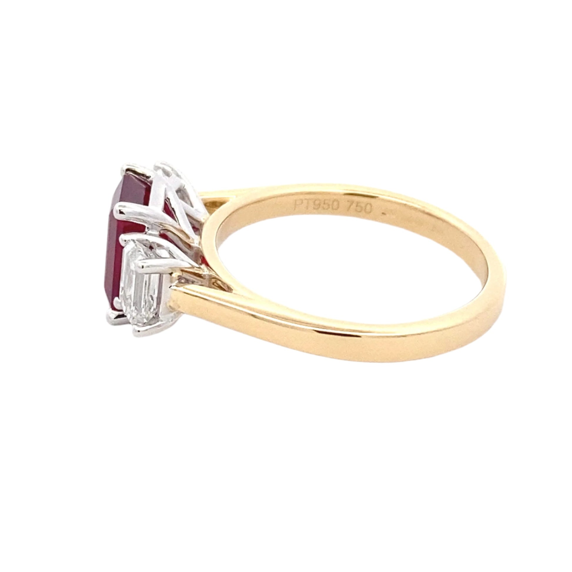 Octagonal Ruby and emerald cut diamond 3 stone ring Gardiner Brothers