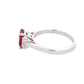 Octagonal shaped Ruby and emerald cut diamond 3 stone ring Gardiner Brothers