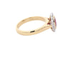 Oval ruby and round brilliant cut diamond vintage style cluster ring Gardiner Brothers