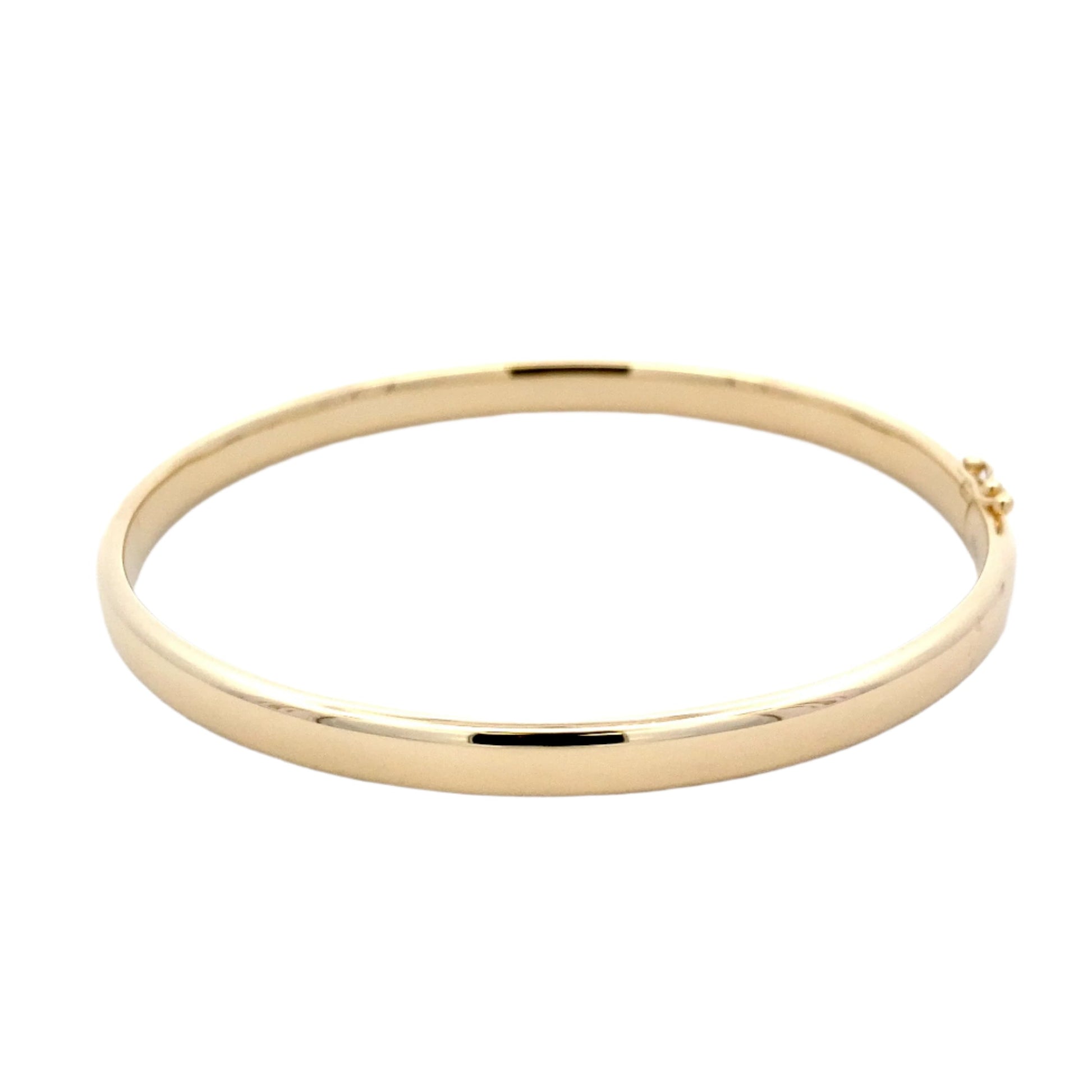 Yellow gold 5mm solid bangle with a court profile Gardiner Brothers