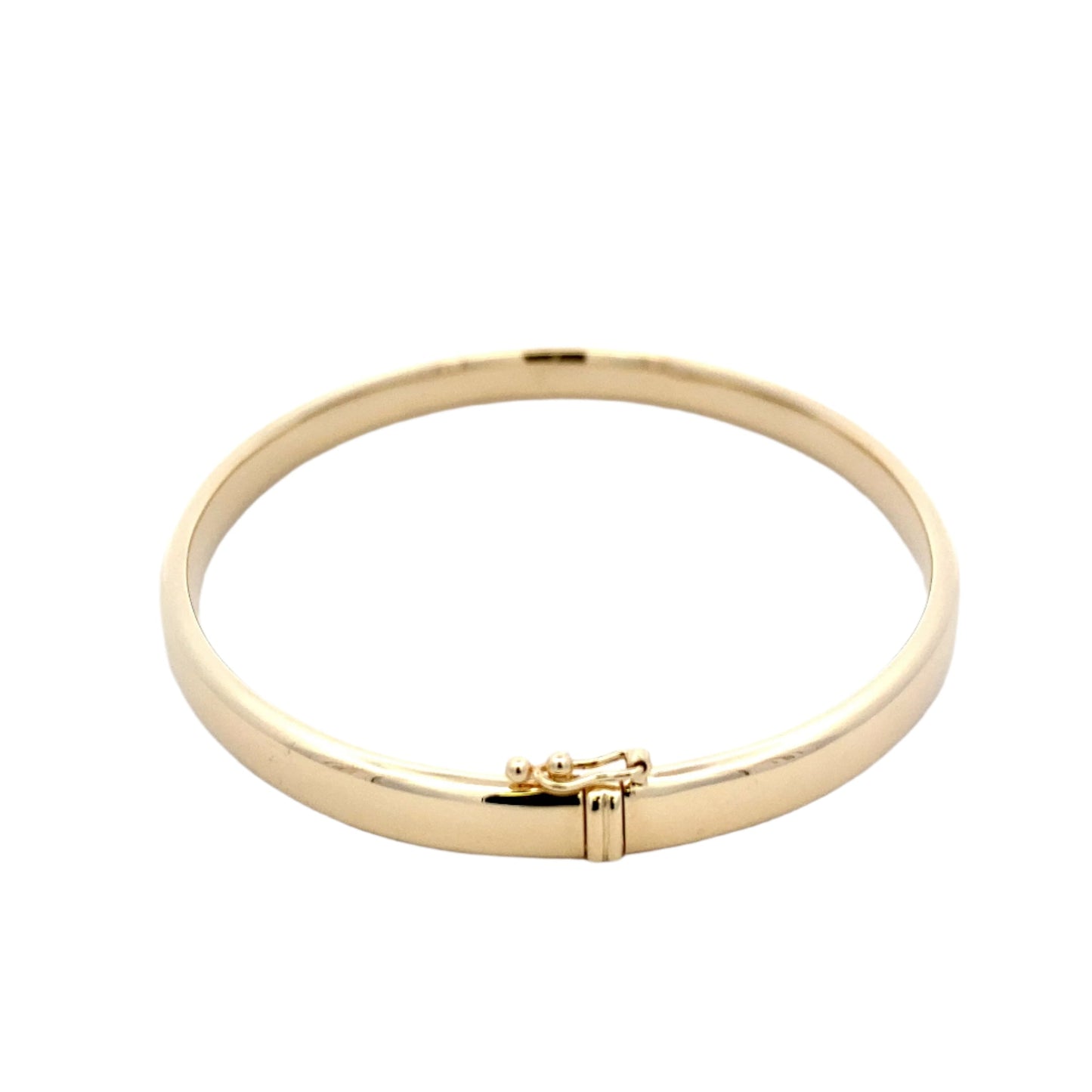 Yellow gold 5mm solid bangle with a court profile Gardiner Brothers