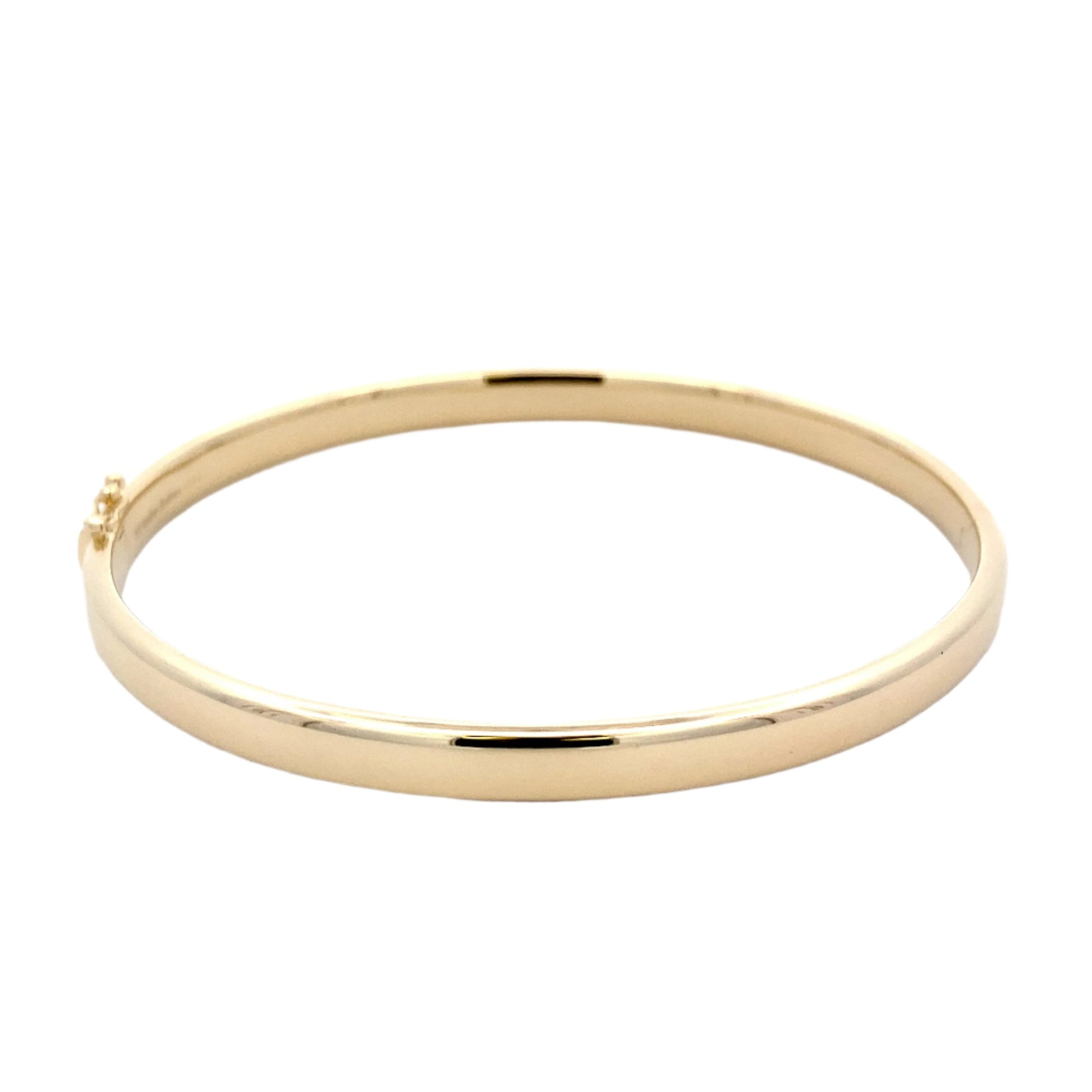 Yellow gold 5mm solid bangle with a court profile Gardiner Brothers