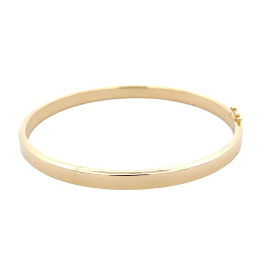 Yellow gold 6mm solid bangle in a flat profile with rounded edges Gardiner Brothers