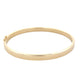 Yellow gold 5mm solid bangle in a flat profile with rounded edges Gardiner Brothers