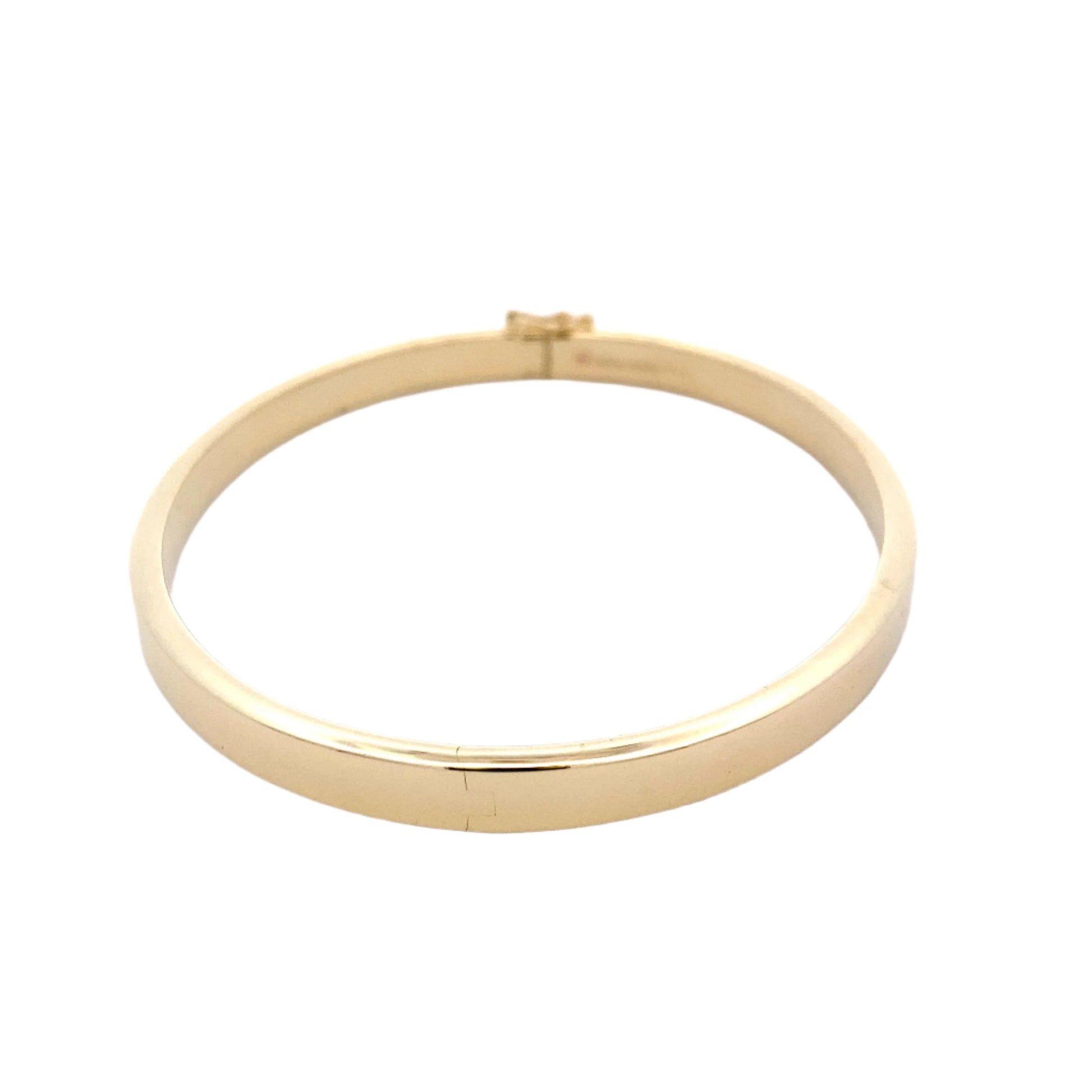 Yellow gold 5mm solid bangle in a flat profile with rounded edges Gardiner Brothers