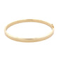 Yellow gold 5mm solid bangle in a flat profile with rounded edges Gardiner Brothers
