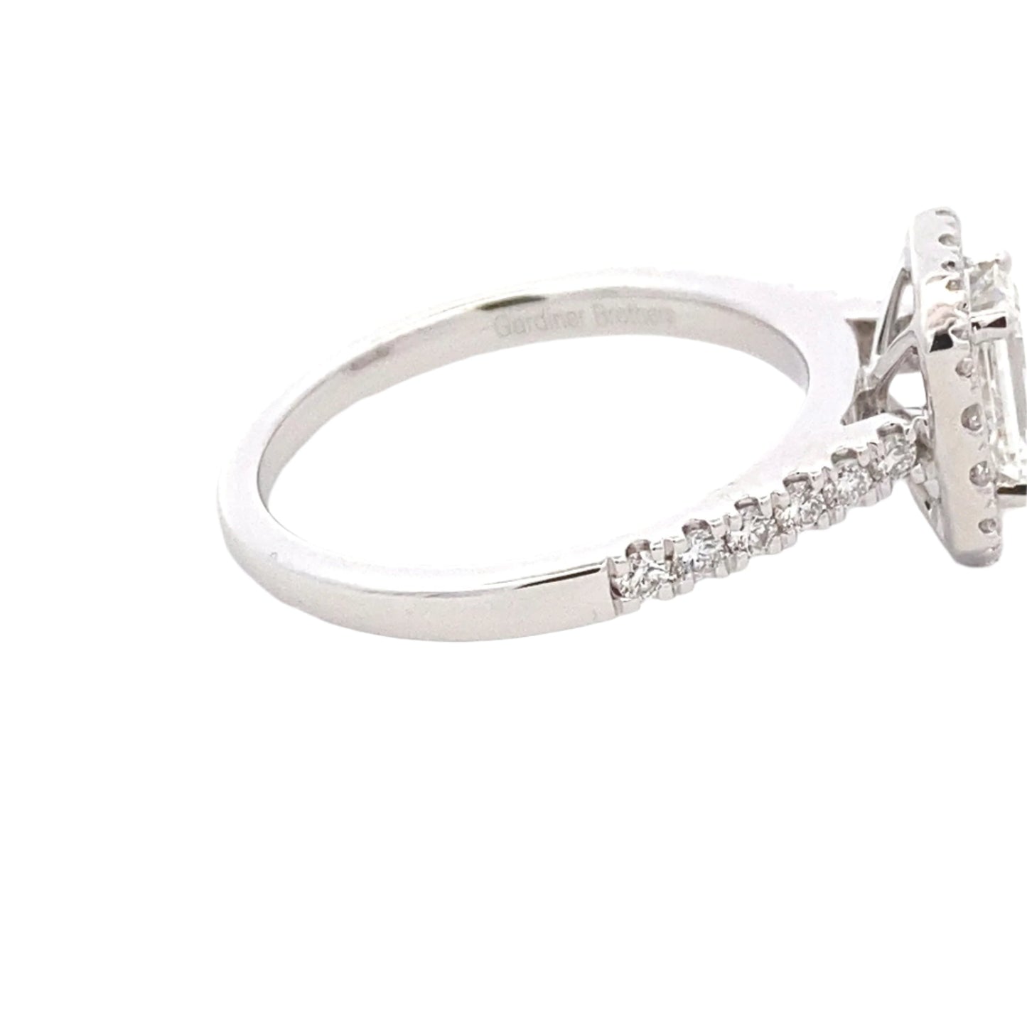 Emerald cut diamond halo cluster style ring - 1.16cts Gardiner Brothers