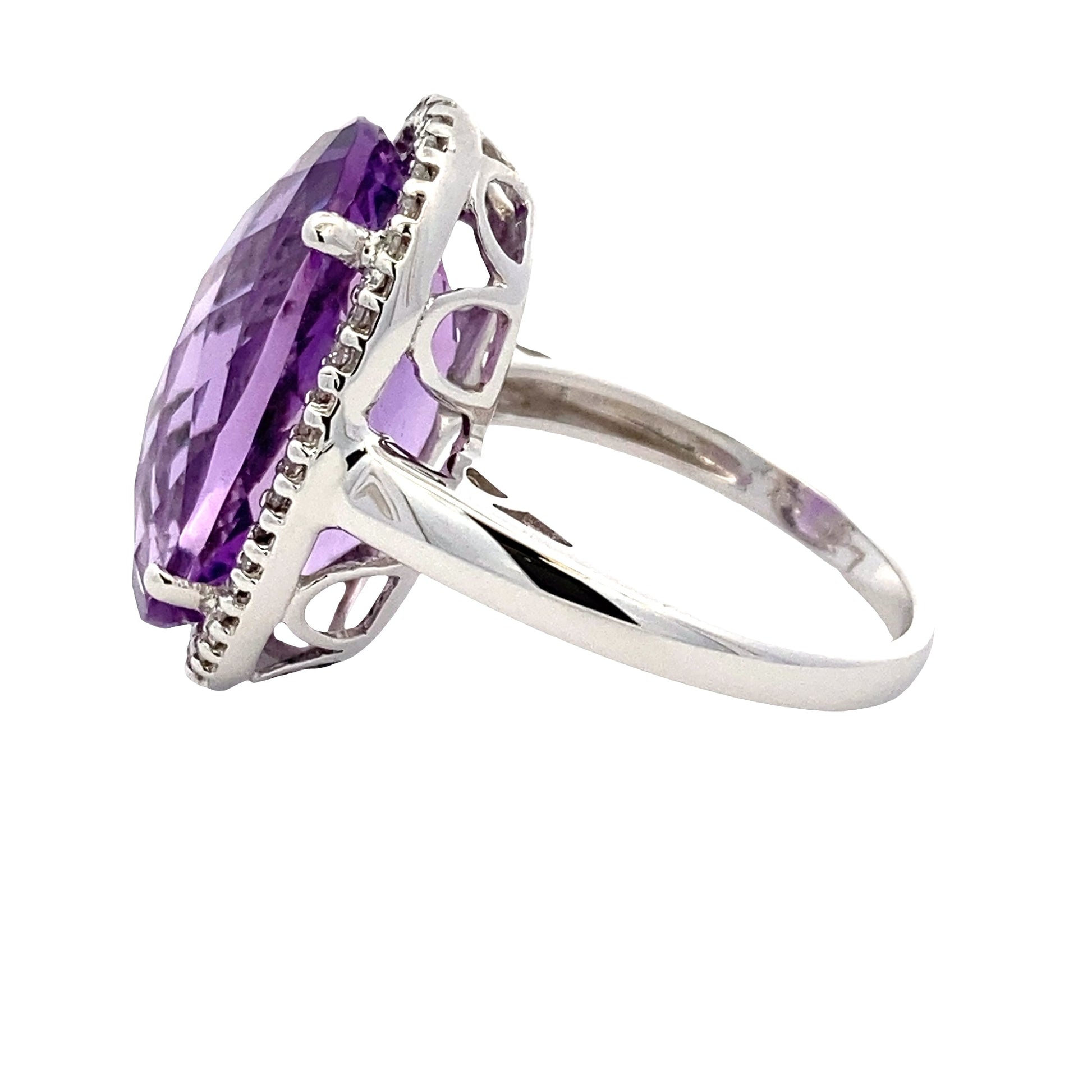 Oval Amethyst and Diamond Halo Ring Gardiner Brothers