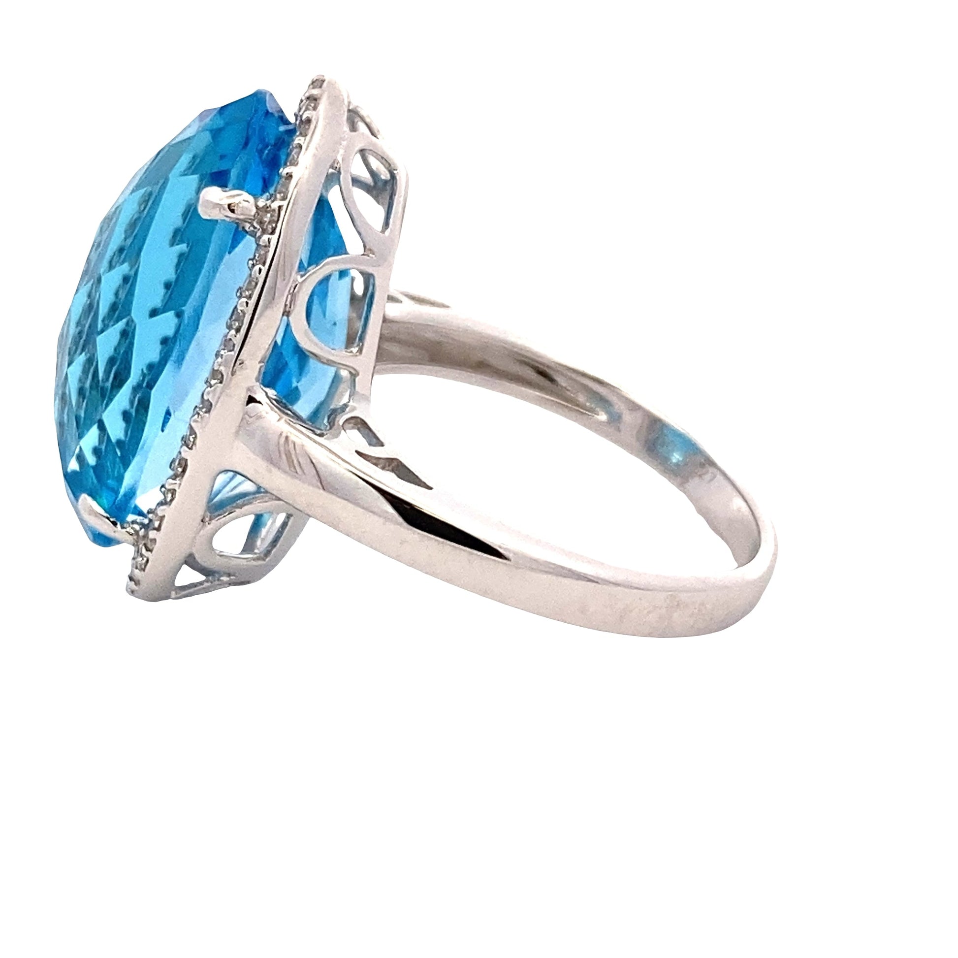 Oval Swiss Blue Topaz and Diamond Halo Ring Gardiner Brothers