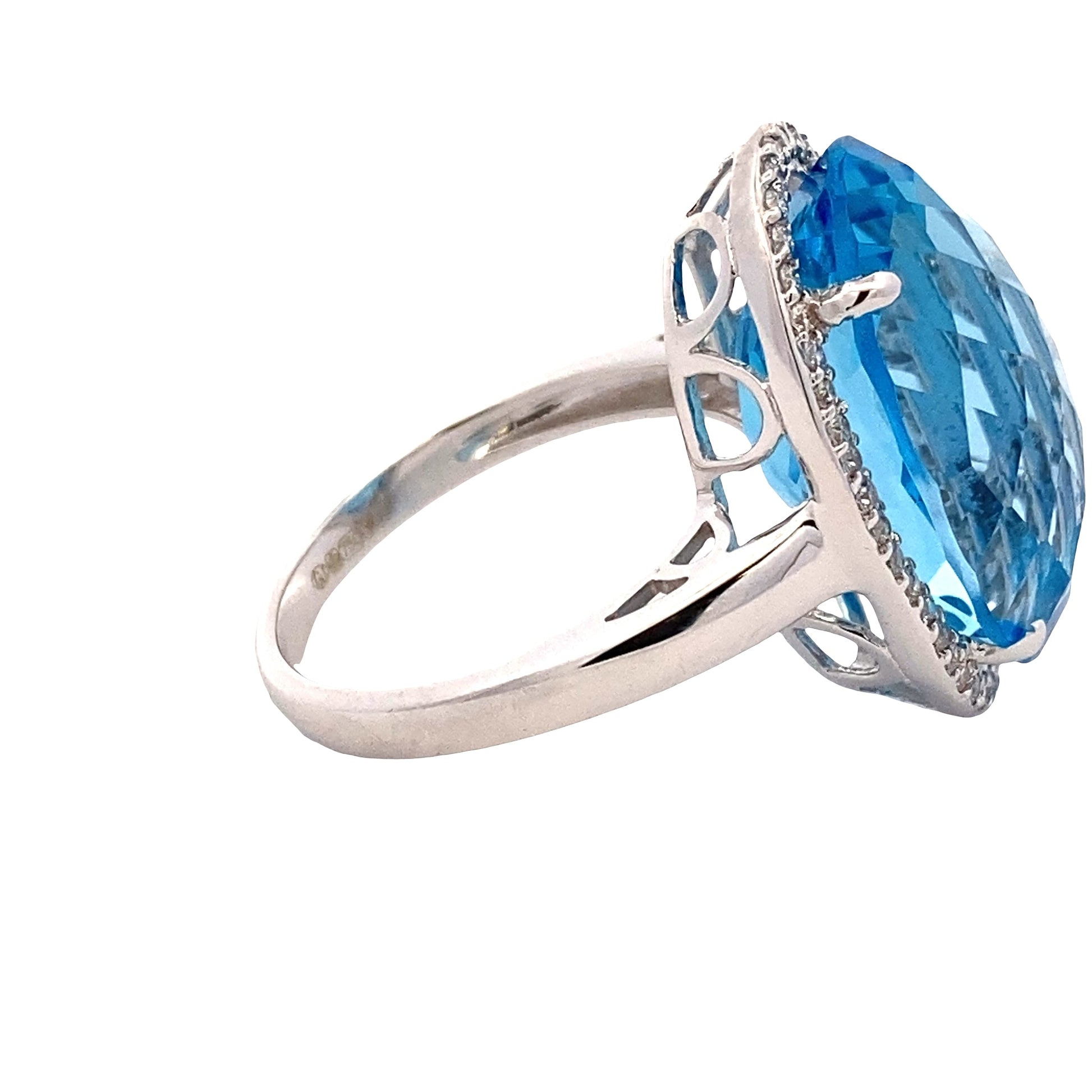Oval Swiss Blue Topaz and Diamond Halo Ring Gardiner Brothers