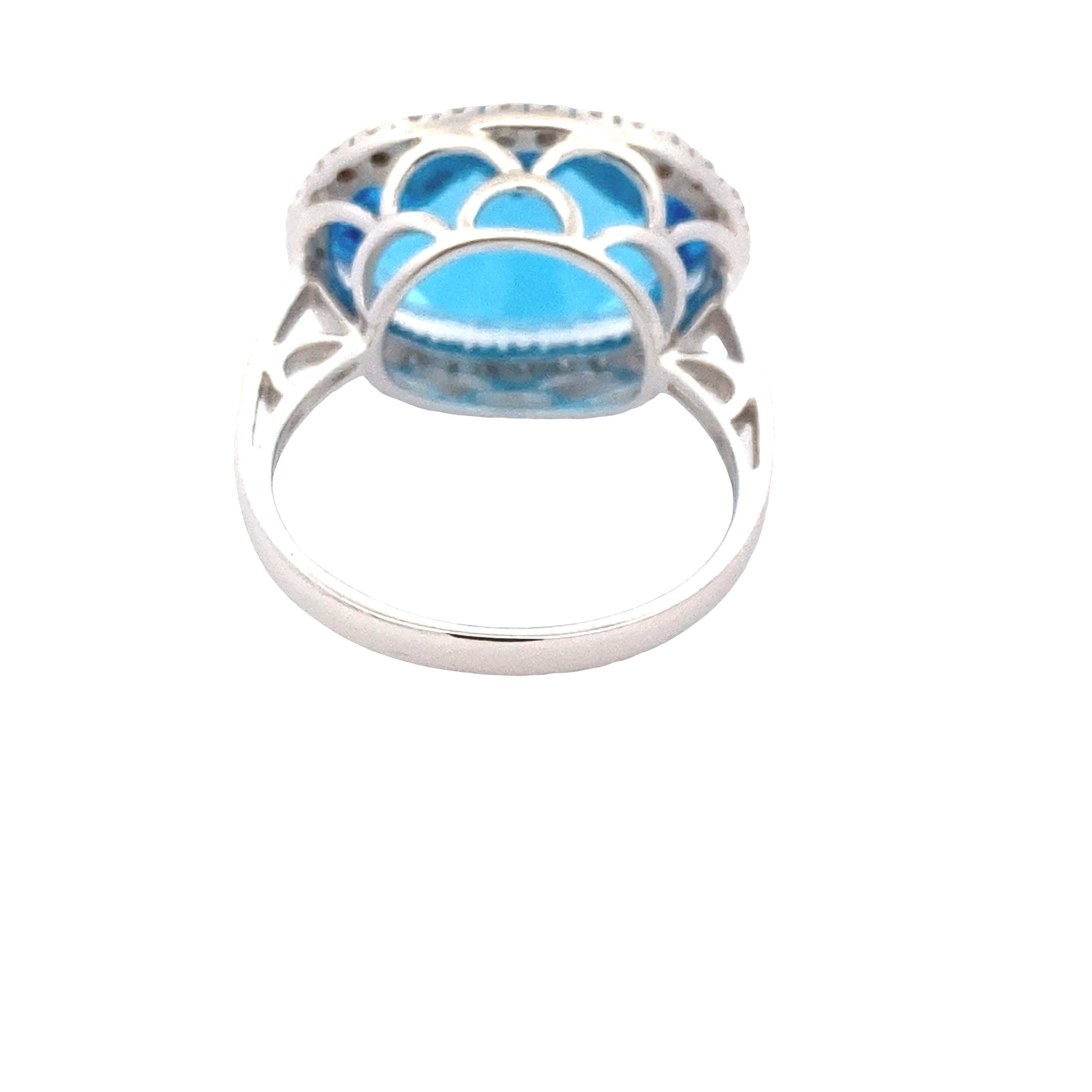 Oval Swiss Blue Topaz and Diamond Halo Ring Gardiner Brothers