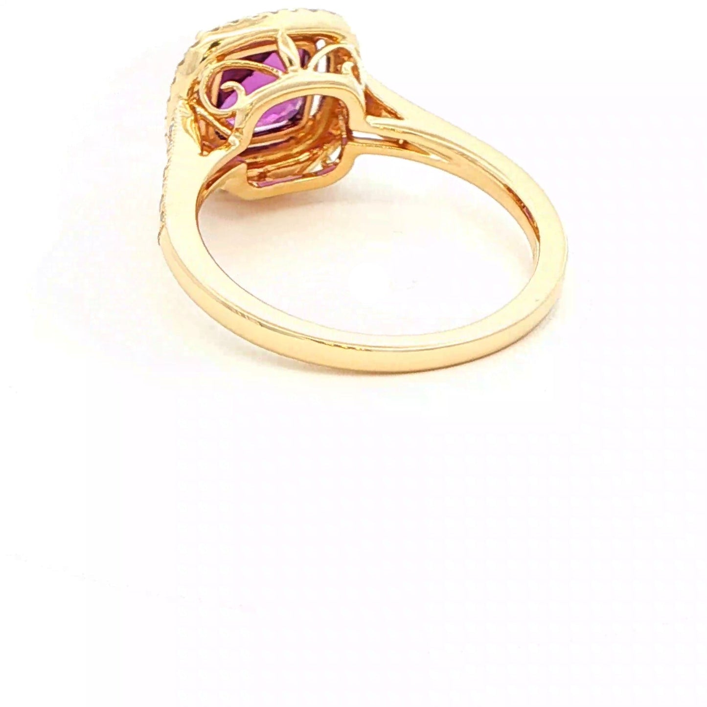 Cushion shaped amethyst and round brilliant cut diamond halo cluster ring Gardiner Brothers