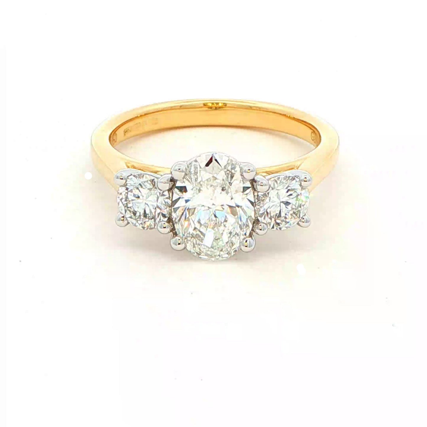 Yellow Gold Oval and round brilliant cut diamond 3 stone ring - 1.80cts Gardiner Brothers