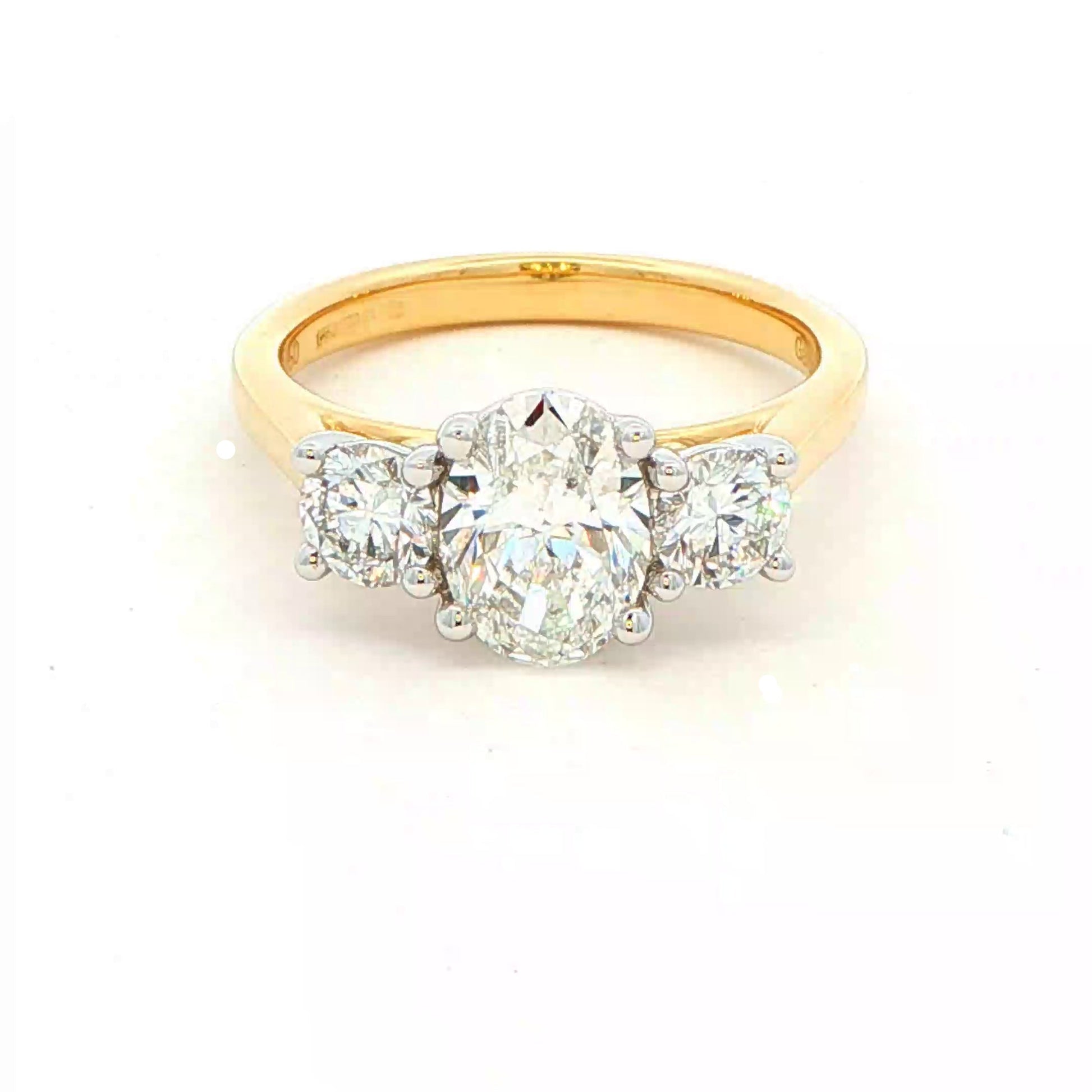Yellow Gold Oval and round brilliant cut diamond 3 stone ring - 1.80cts Gardiner Brothers