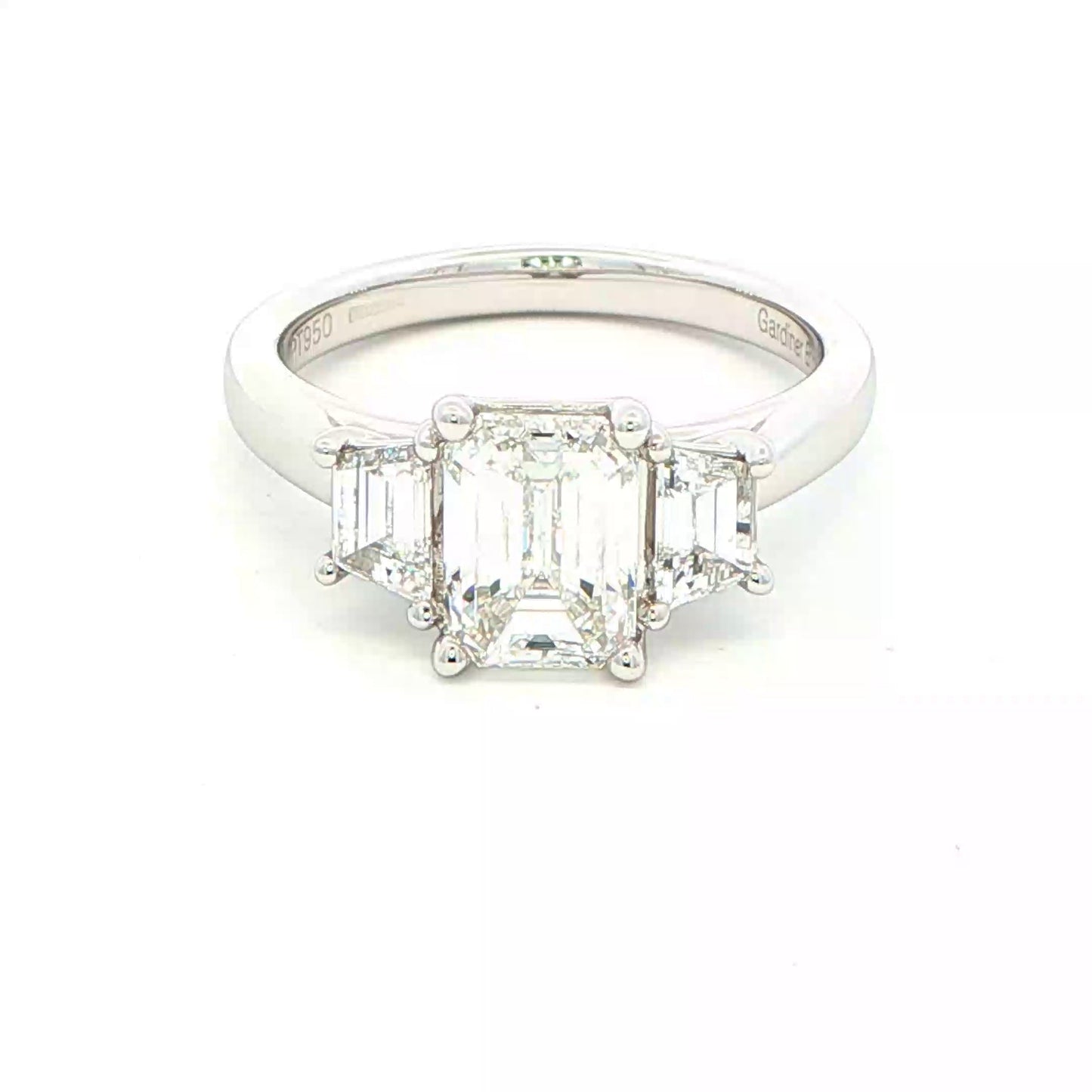 Platinum Emerald and Trapezoid cut diamond 3 stone ring - 2.00cts Gardiner Brothers