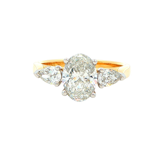 Oval and pear shaped diamond 3 stone ring - 1.95cts