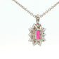 Octagonal shaped Ruby and round brilliant cut diamond cluster style pendant