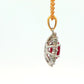 Oval shaped ruby and round brilliant cut diamond cluster style pendant