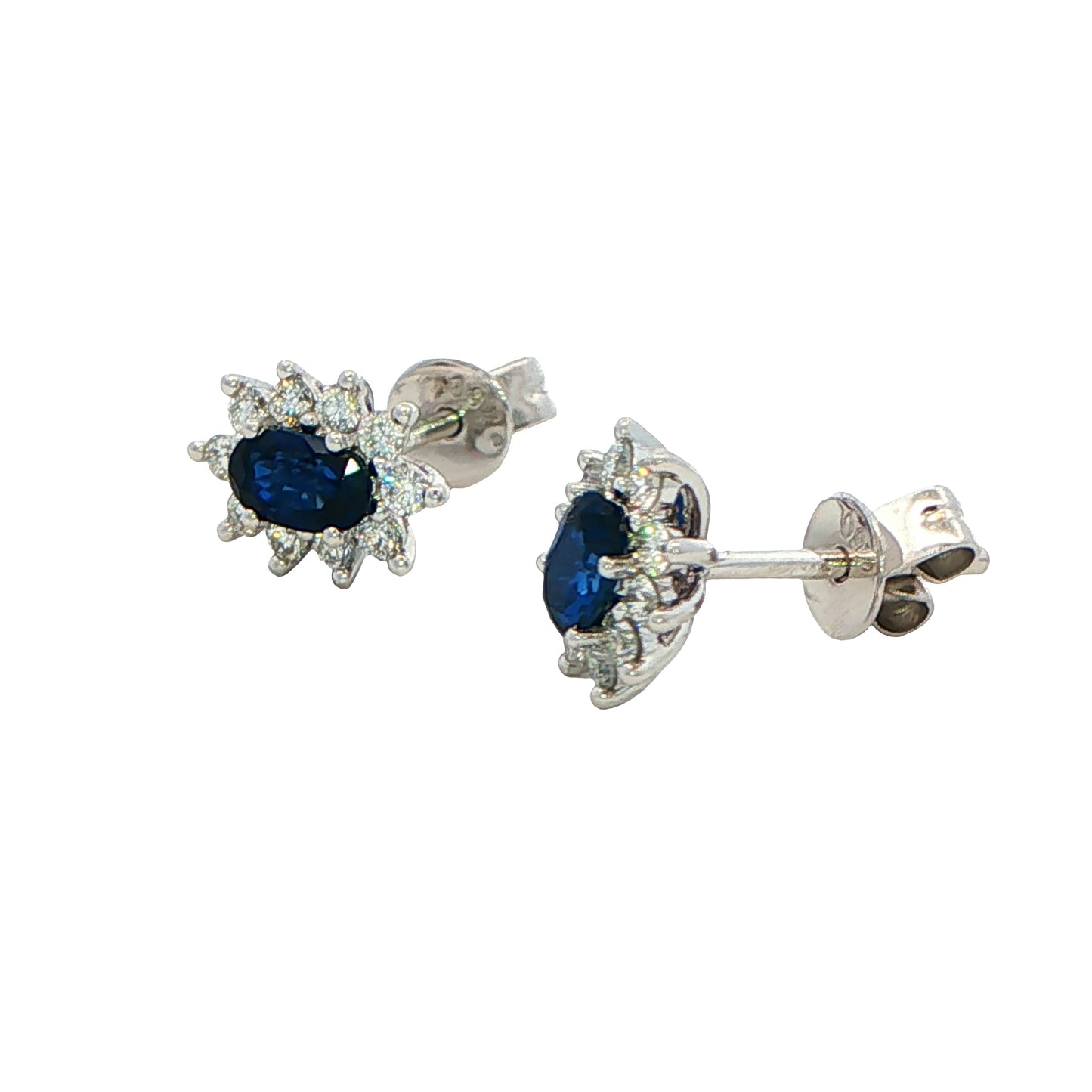 Oval shaped sapphire and round brilliant cut diamond cluster style earring