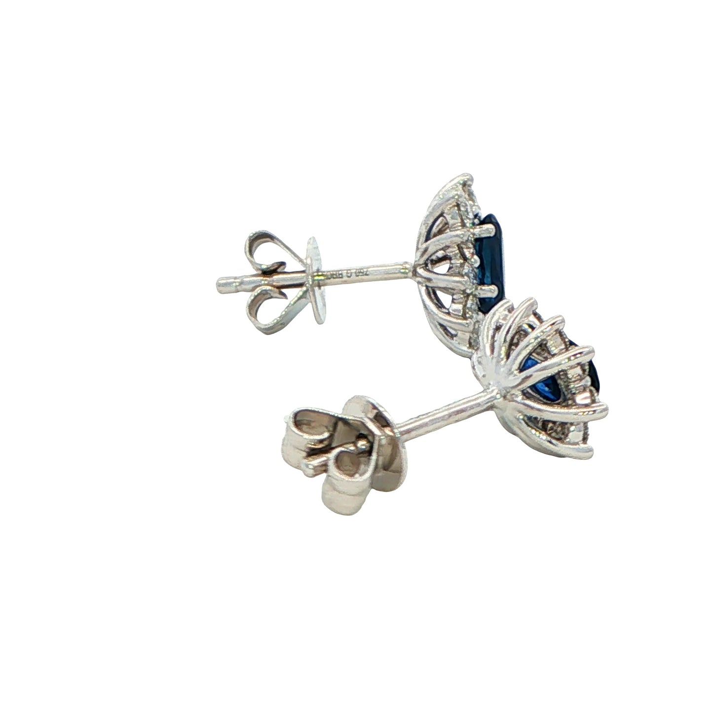 Oval shaped sapphire and round brilliant cut diamond cluster style earring