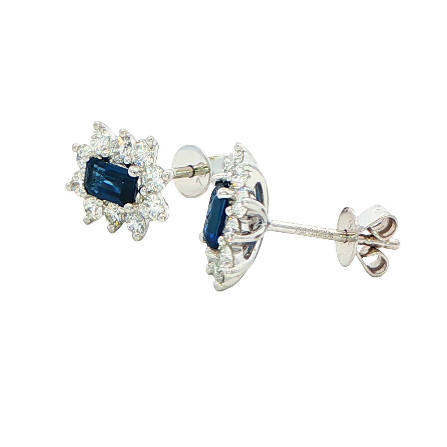 Octagonal shaped sapphire and round brilliant cut diamond cluster style earrings.