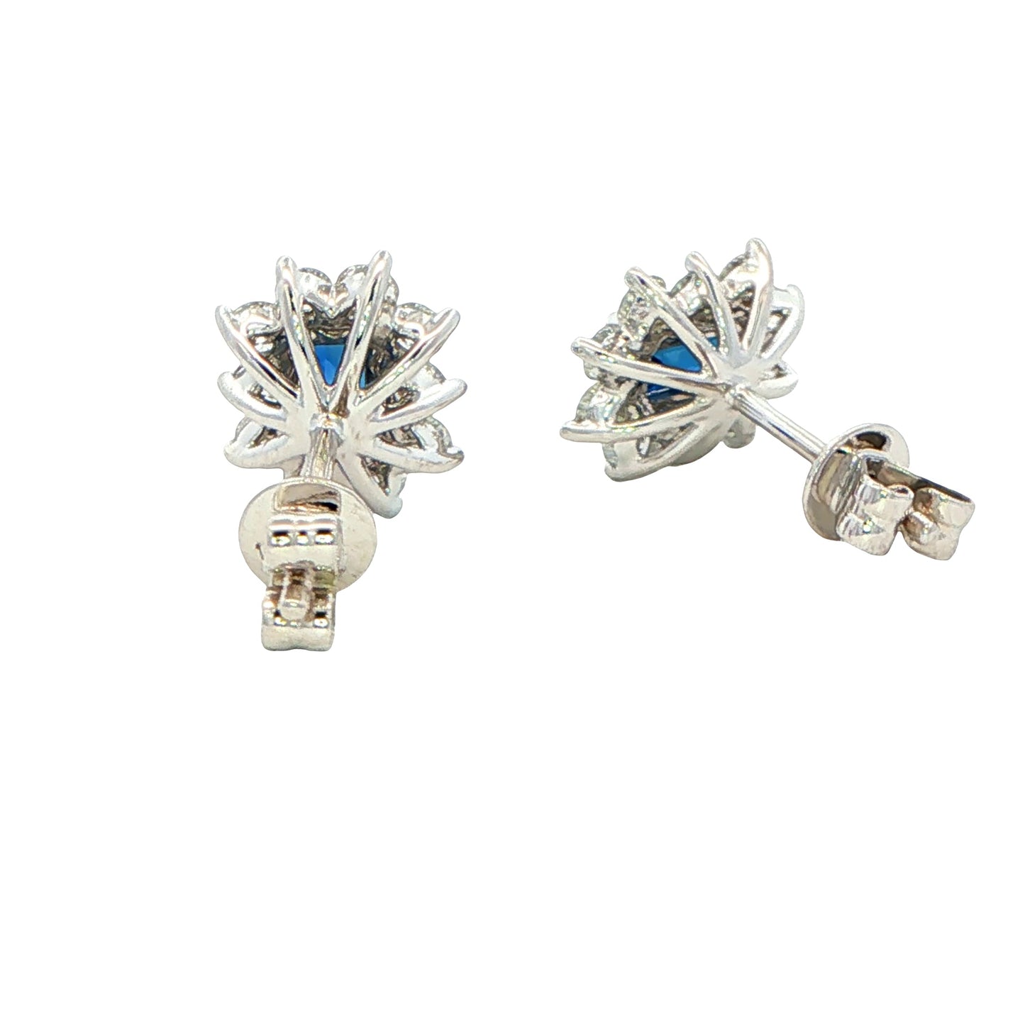 Octagonal shaped sapphire and round brilliant cut diamond cluster style earrings.