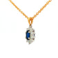 Oval shaped sapphire and round brilliant cut diamond cluster style pendant