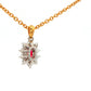 Oval shaped ruby and round brilliant cut diamond cluster style pendant